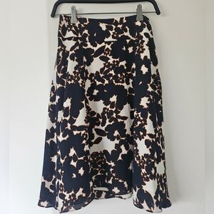 The Limited Black and White Asymmetrical Midi Skirt